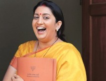 Is she, isn’t she, that is the question. The question hangs over HRD minister’s Grad degree.